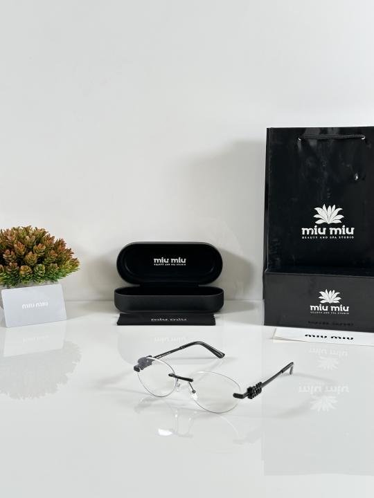 Miu Miu WMNS 1025 Black Day Night Colour Changing Glass